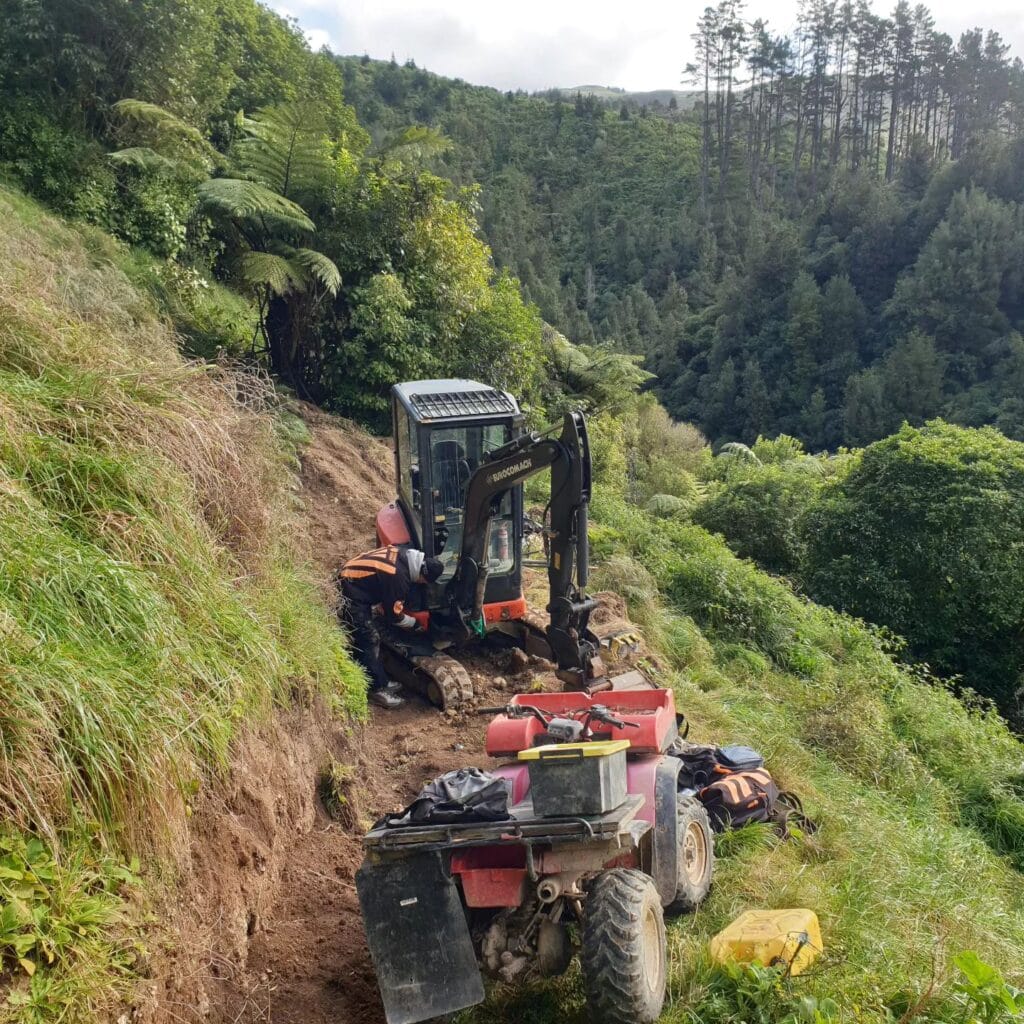 Velstand trail builder's digger and quad bike
