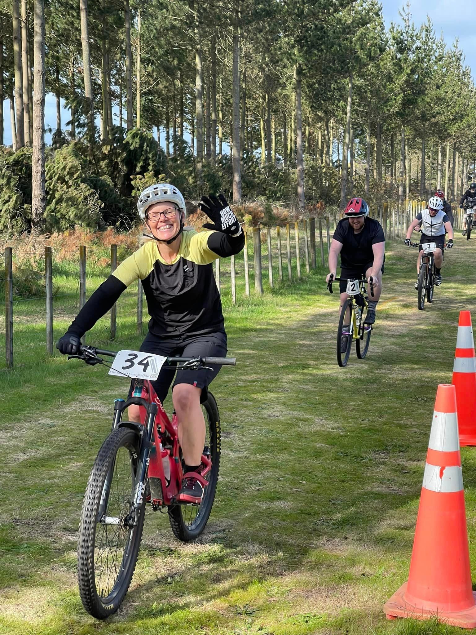 competitor waving